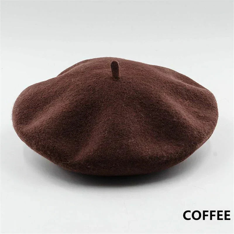 Fashionable women's classic wool beret in navy blue, a versatile winter accessory.