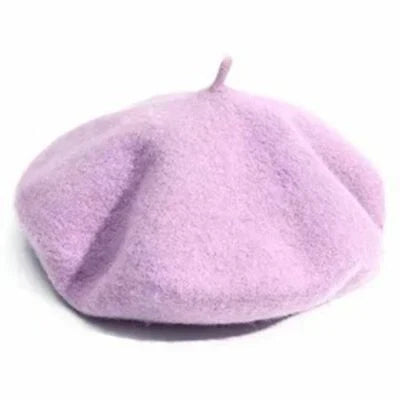 Women's fuchsia wool beret, a vibrant and fashionable winter hat for bold statements.