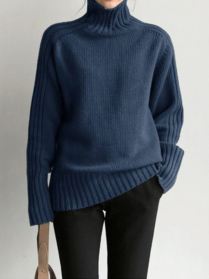 Chic green women's classic roll neck sweater, a cozy knit top for versatile winter fashion and work outfits.