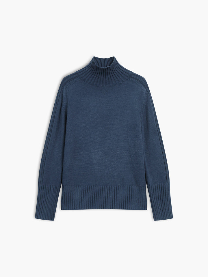 Elegant navy women's roll neck sweater, a versatile long sleeve top for casual wear or sophisticated work outfits.