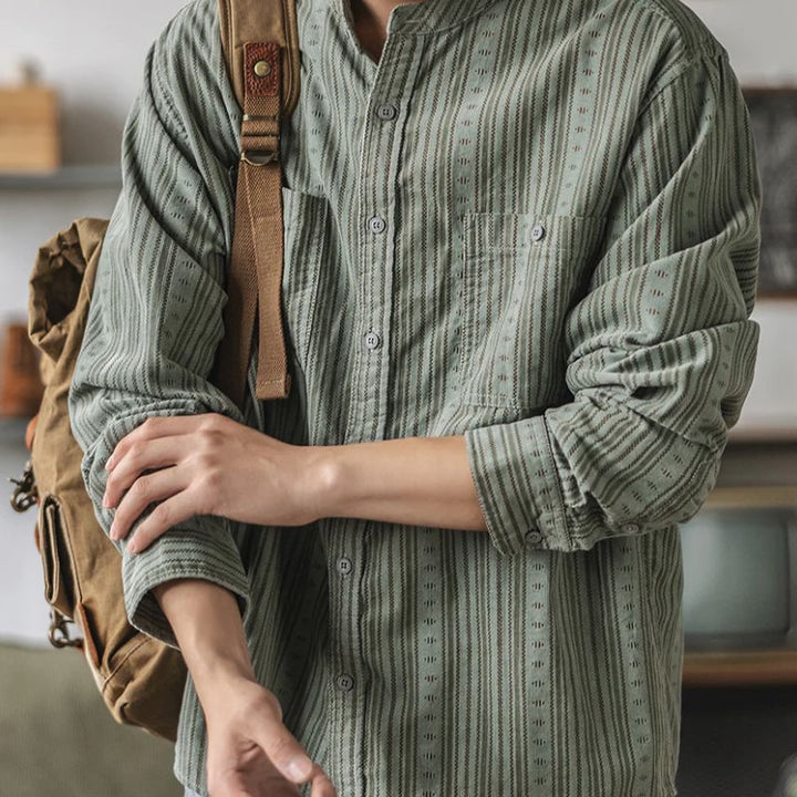 Apricot striped button-down shirt for women, a vintage-style long sleeve top, perfect for spring casual wear.