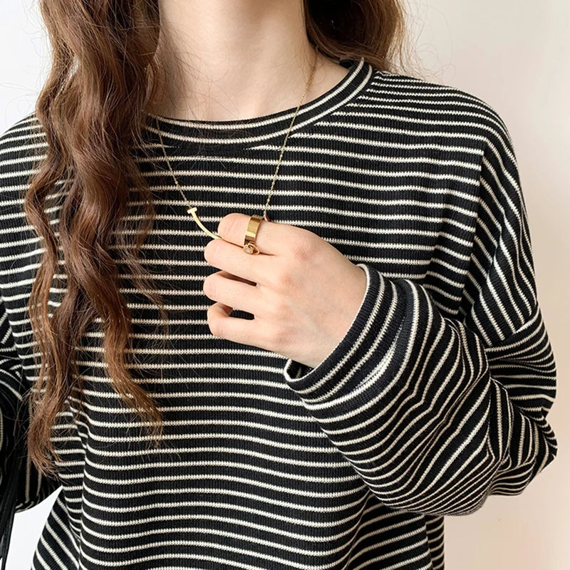 Classic women's striped crewneck top, an effortless style essential for versatile casual wear.