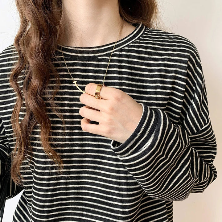 Classic women's striped crewneck top, an effortless style essential for versatile casual wear.