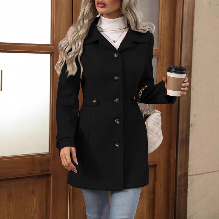 Long women's trench coat featuring an adjustable belt and classic notch collar, great for stylish layering.