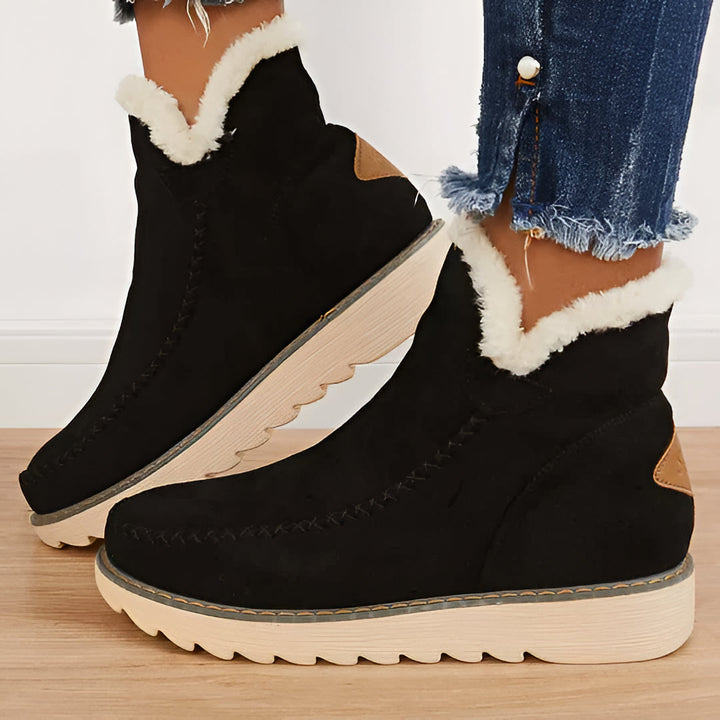 Stylish women's warm snow booties. Comfortable ankle boots, perfect for winter casual wear & orthopedic support.