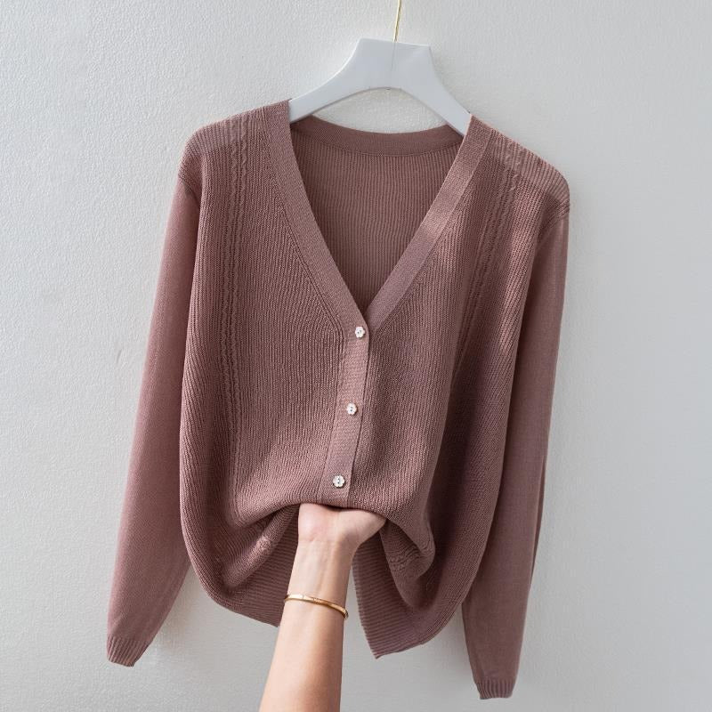 Women's casual elegant silk blend V-neck knit top with button-up detail, short sleeve.