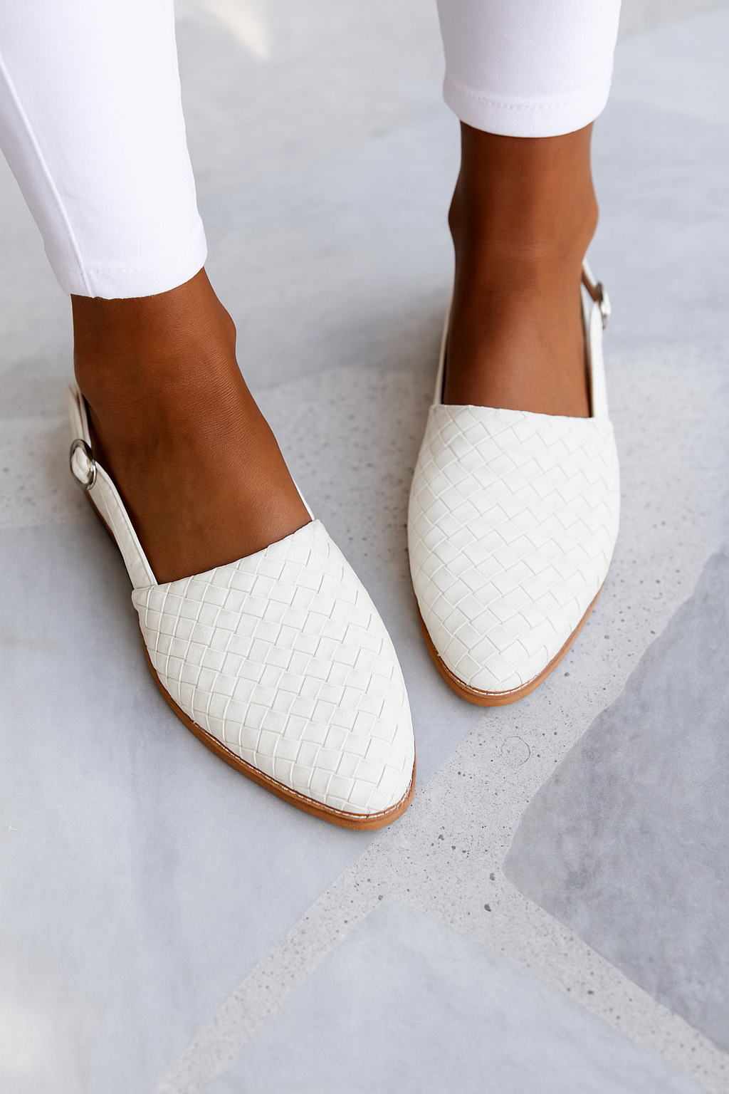 Modern women's closed toe slip-on mules, comfortable casual flats for everyday style.