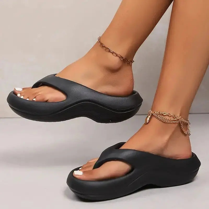 Casual women's platform flip flops featuring cloud-like cushioning, arch support & non-slip design.