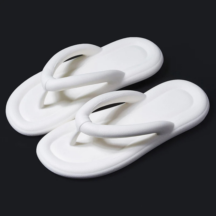Ergonomic women's comfort flip-flops featuring cloud-soft soles, perfect for summer & beach.