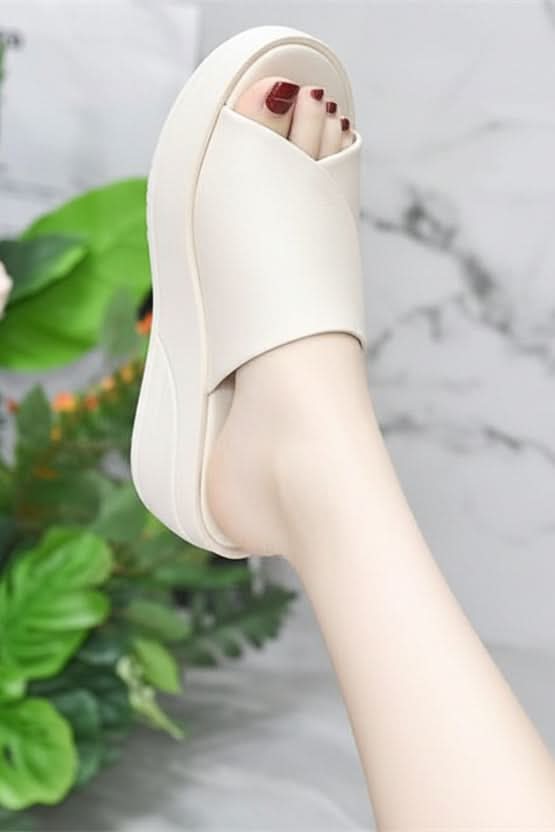Pair of women's cloud-soft cushioned sandals in a bright color, ready for summer, beach, or casual outings.