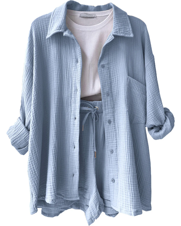 Summer women's cotton two-piece set, breathable top & shorts, great for relaxing.