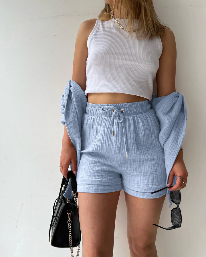 Women's vacation cotton lounge wear, two-piece shorts and top for comfort.