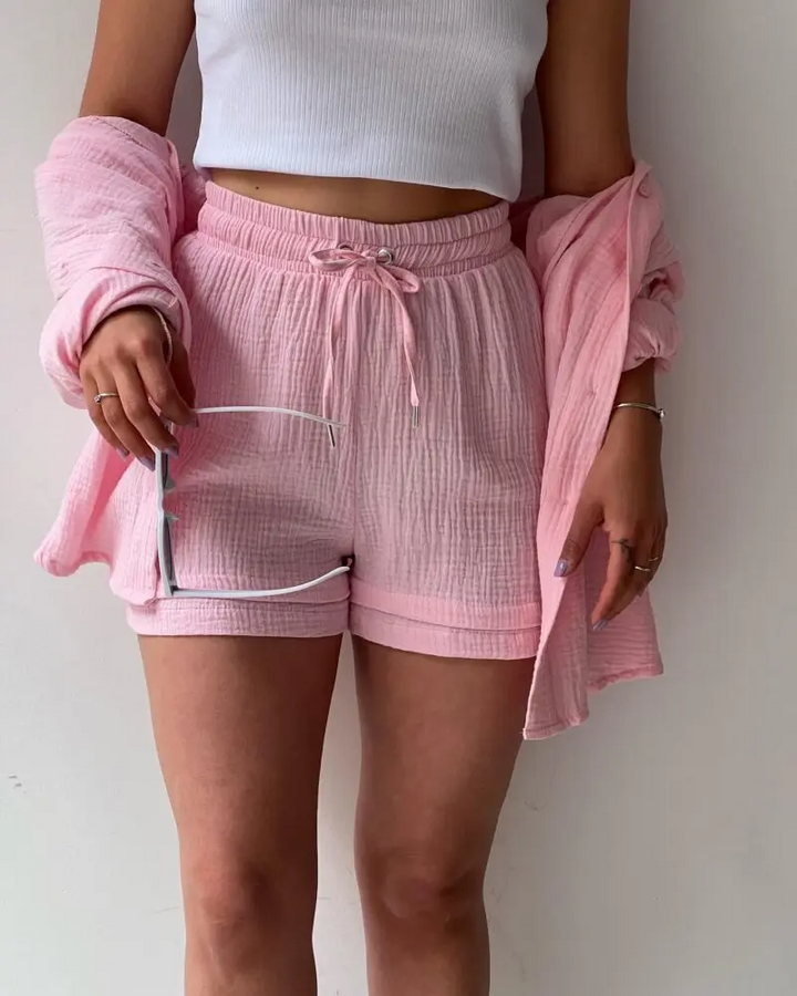 Soft women's cotton lounge set, shorts & top, relaxed fit for all-day comfort.