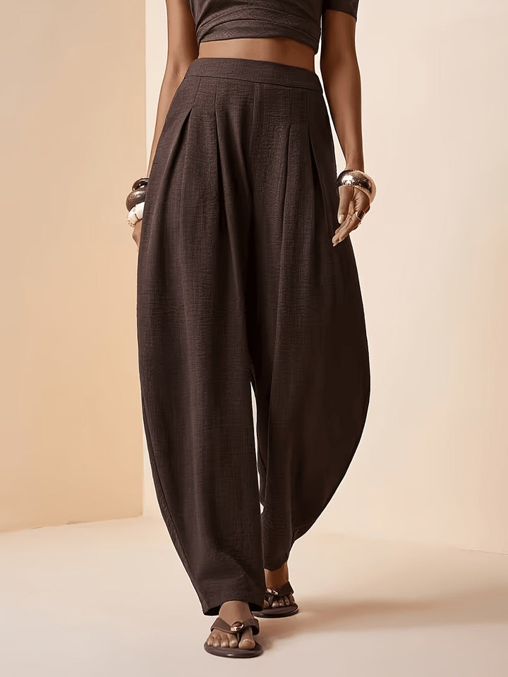 Women's coffee brown high-waist harem pants with tapered ankle for comfortable, chic everyday fashion.