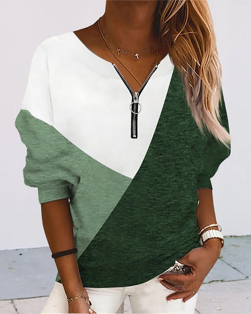 Stylish color block zip sweatshirt for women. V-neck design offers versatile, everyday comfort.
