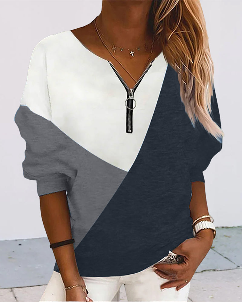 Women's casual color block zip sweatshirt, featuring a V-neck and long sleeves for everyday comfort.