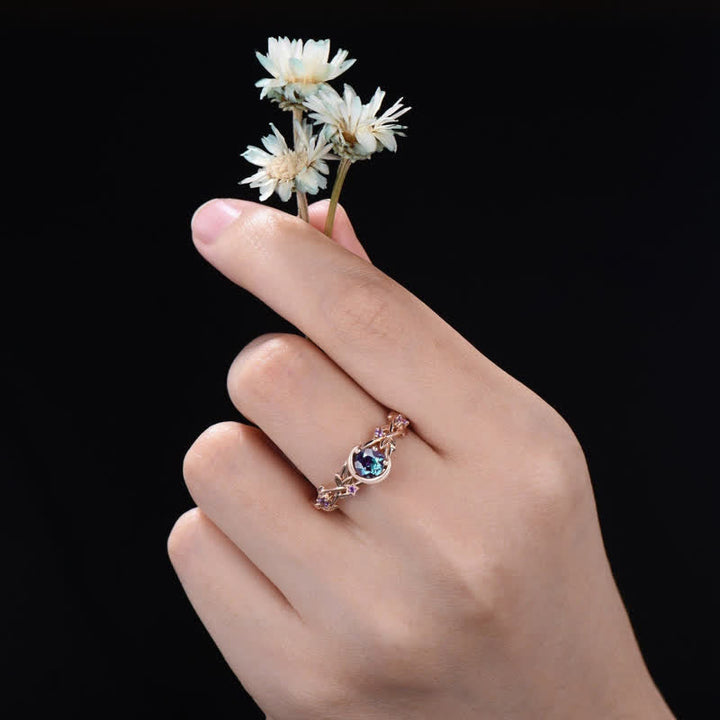 Nature-inspired gold women's Alexandrite Amethyst ring with delicate leaf design.