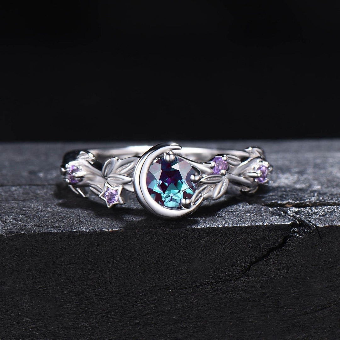 Sterling silver women's engagement ring with vibrant color change Alexandrite & Amethyst.