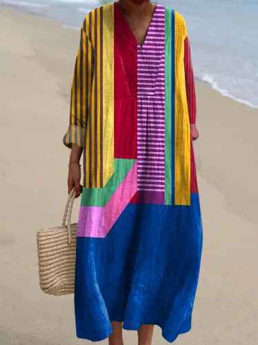 Flowy women's bohemian maxi dress featuring a vibrant patchwork print, ideal for comfortable elegant spring fashion.