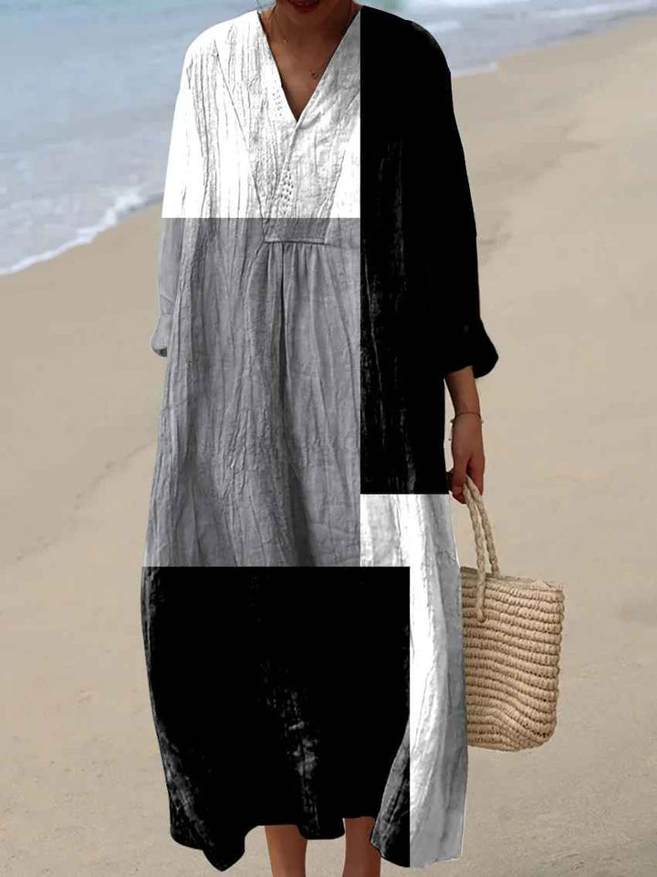 Vibrant women's bohemian patchwork maxi dress with a flattering V-neck, perfect for stylish elegant casual summer wear.