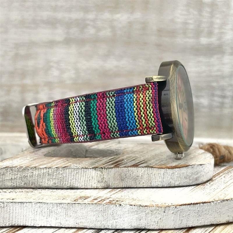 Elyvra women's vintage-inspired watch featuring a vibrant rainbow dial and stylish braided strap