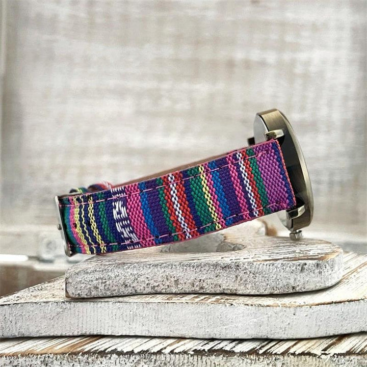 Fashionable women's watch with a multi-colored rainbow pattern and a chic braided band, ideal gift