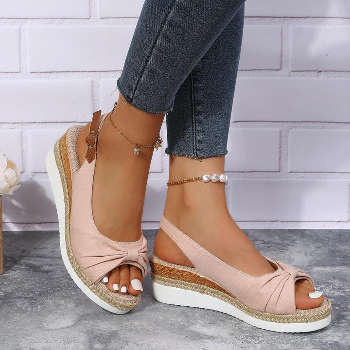 Soft ComfiLift women's wedge sandals with cushioned footbed for ultimate all-day comfort.