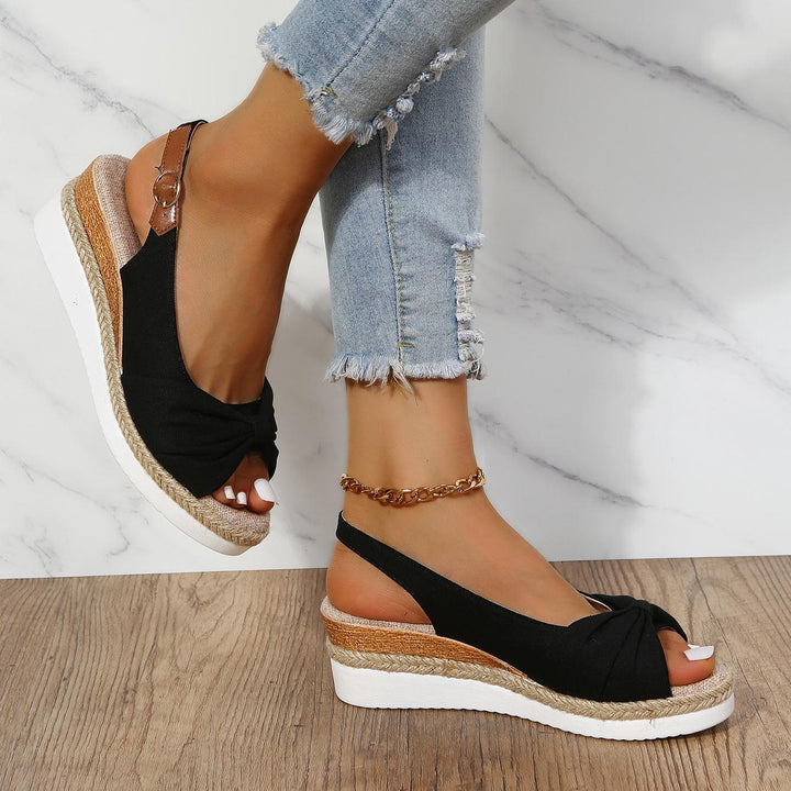 Elegant ComfiLift women's wedge sandals, dressy yet comfortable for long summer evenings.