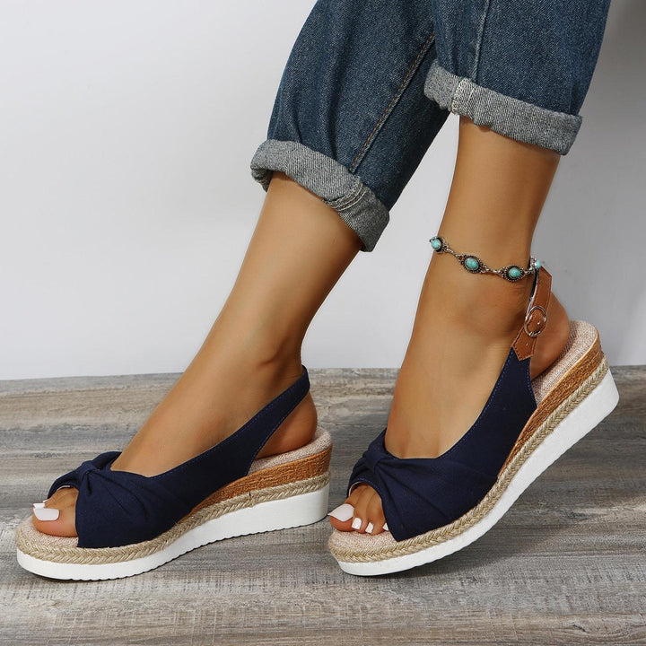 ComfiLift women's adjustable wedge heel sandals, combining style with all-day comfort.