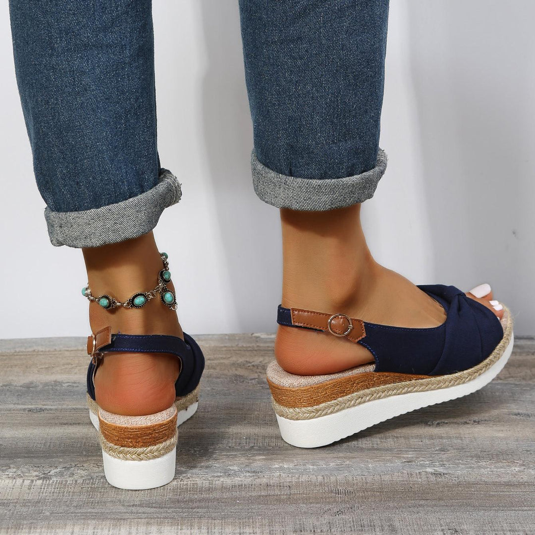 Walking in ComfiLift women's comfortable wedge sandals, ideal for all-day summer strolls.