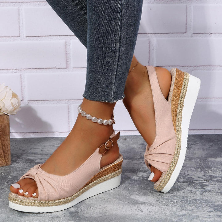 Stylish ComfiLift ladies wedge sandals with adjustable straps for all-day comfort.