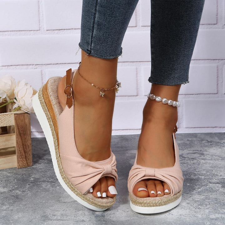 Modern ComfiLift women's wedge sandals, designed for all-day comfort and contemporary style.