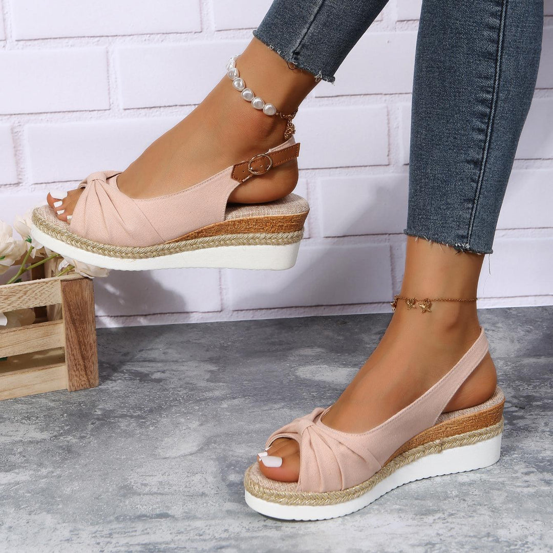 ComfiLift women's practical wedge sandals, offering stylish all-day support for busy days.