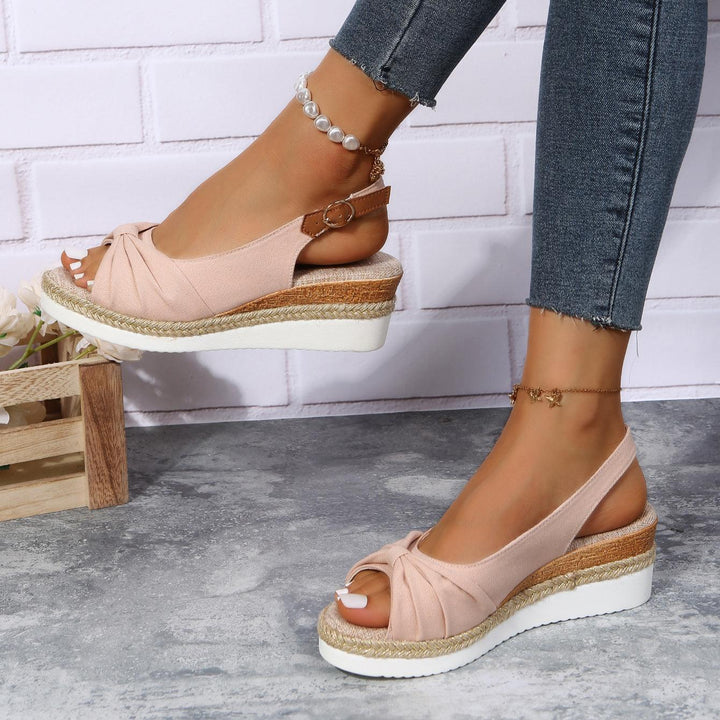 ComfiLift women's practical wedge sandals, offering stylish all-day support for busy days.
