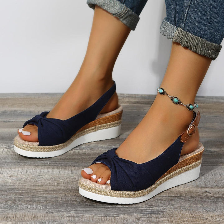 Essential ComfiLift women's wedge sandals for summer, offering all-day comfort and style.