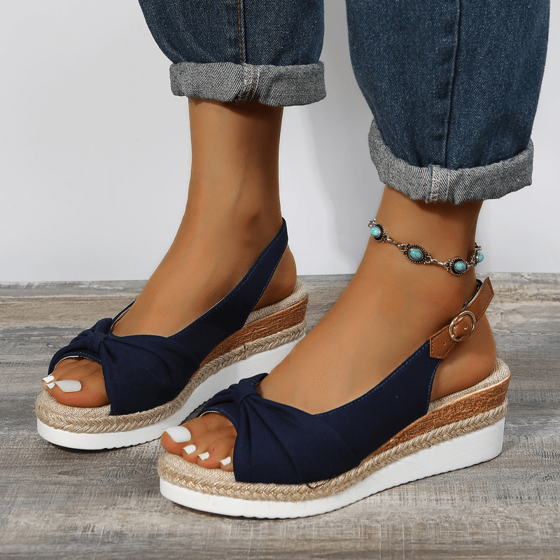 Women's ComfiLift wedge sandals, featuring soft straps for maximum all-day comfort.