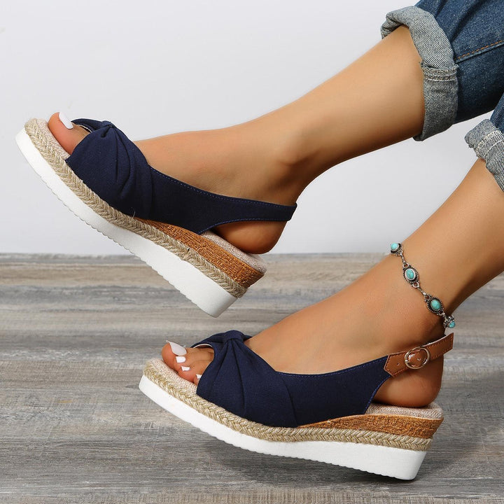 Enjoy all-day comfort with ComfiLift women's stylish wedge sandals, ideal for summer.