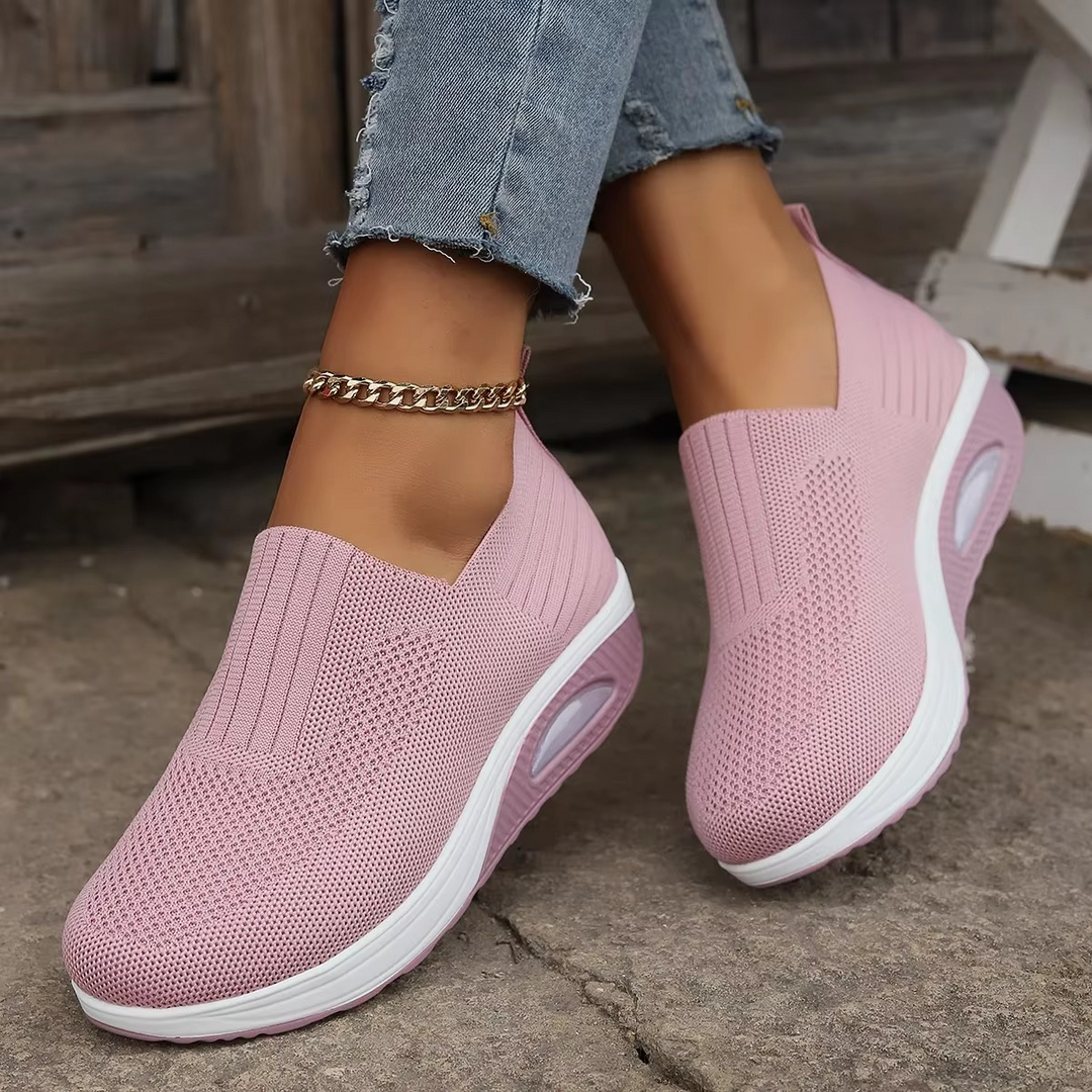 Women's comfort footwear providing orthopedic support & air-cushioning. Ideal for foot pain relief during long walks.