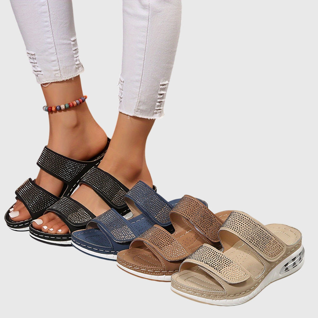 Stylish women's open-toe sandals with arch support, perfect for everyday summer wear.