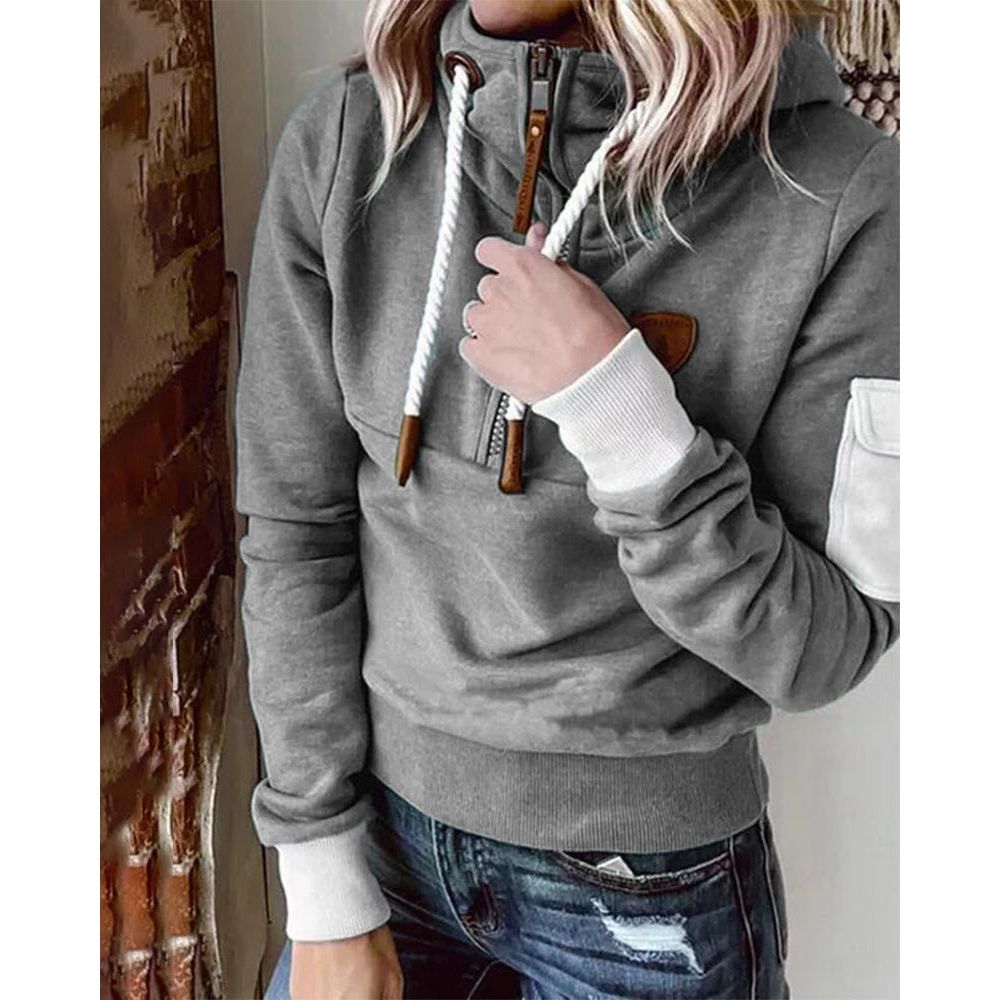 Long sleeve women's zip up hoodie, comfortable solid color top for casual everyday wear in fall/winter.