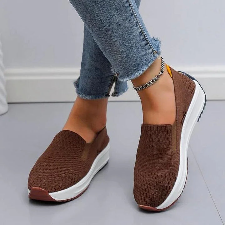 Orthopedic support women's slip-on walking shoes with a flexible, breathable knit design for ultimate comfort.