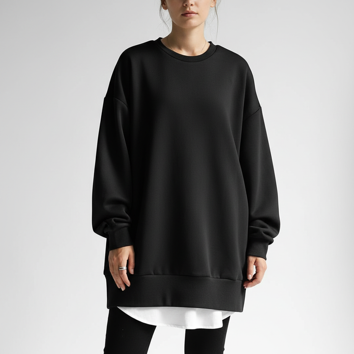 Woman wearing a comfortable oversized knit sweater, ideal for casual autumn and winter fashion