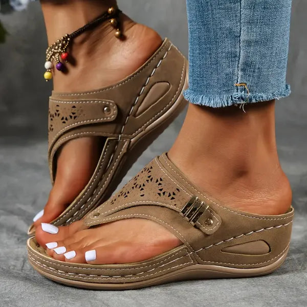 Comfortable women's wedge sandals with an adjustable ankle strap & open-toe design for versatile spring style.