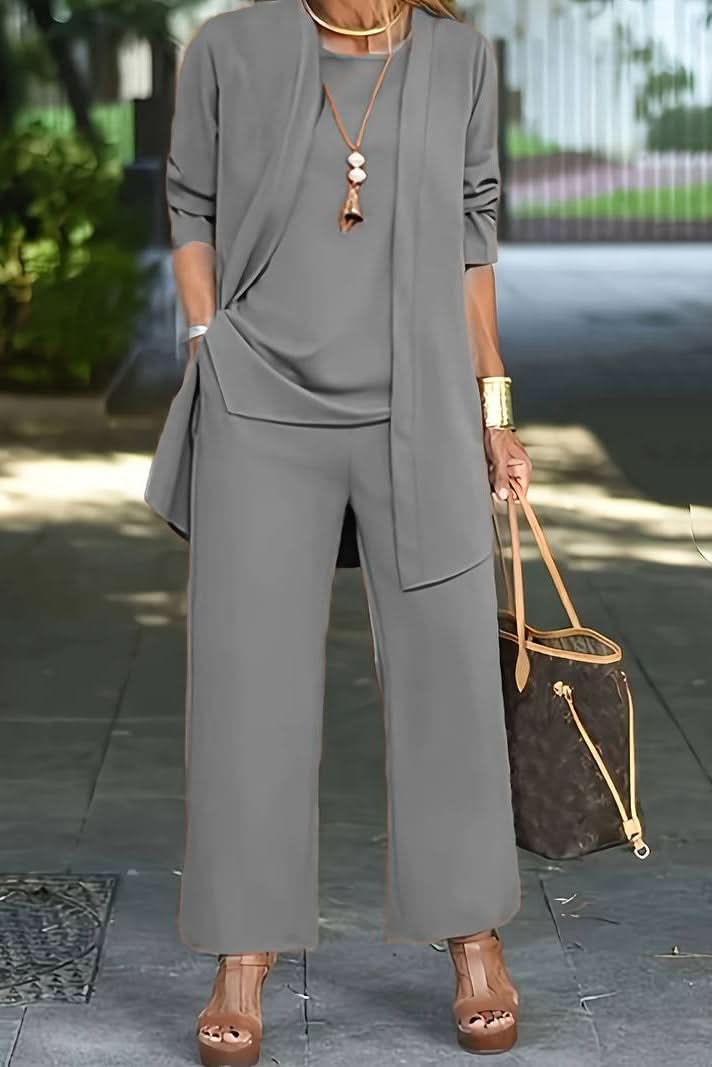 Women's casual 3-piece summer set with tank top, shorts, and long cover-up for versatility.