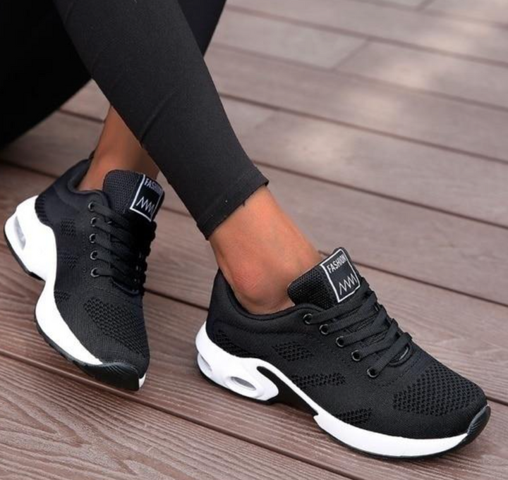 Women's comfortable air-cushioned athletic sneakers for running & walking, designed for active lifestyles.