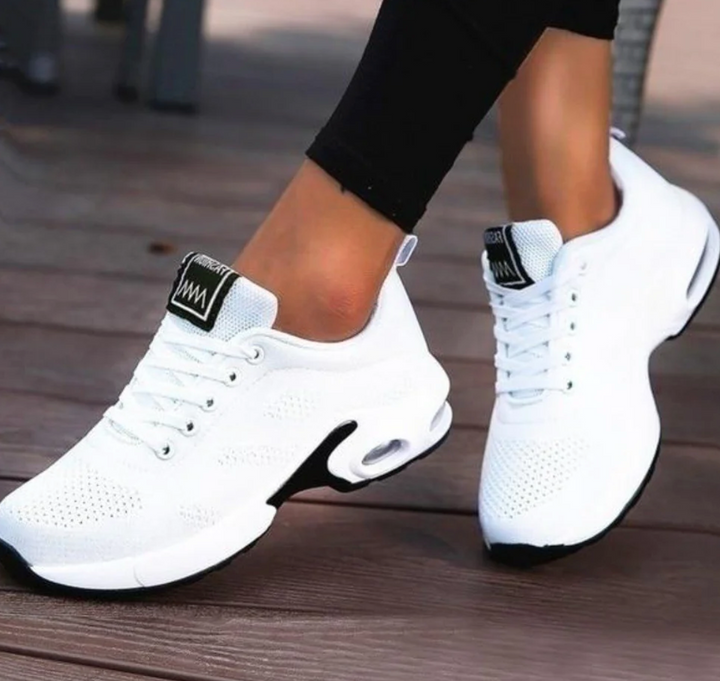 Soft women's air-cushioned sneakers, ideal for daily walks, running, and active everyday comfort.