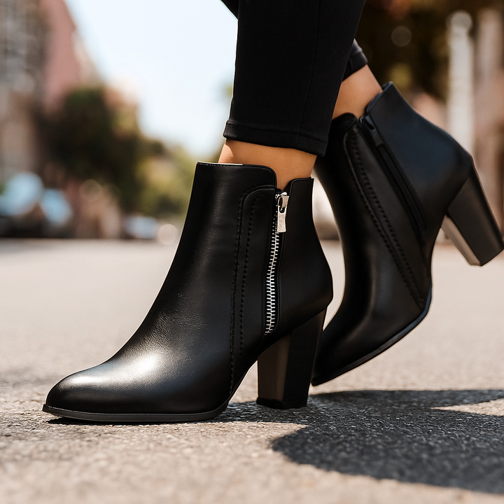 Stylish women's fall ankle boots featuring a chic scalloped edge and easy-zip closure for casual comfort.