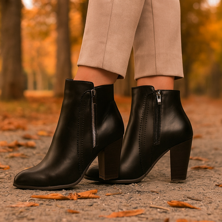 Versatile women's everyday ankle boots with a practical zipper and unique scalloped detailing for various outfits.