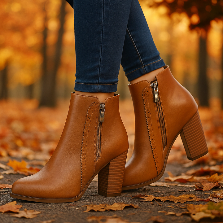 Dressy-casual women's ankle boots, perfect for fall/winter, with a side zipper and decorative scalloped edge.