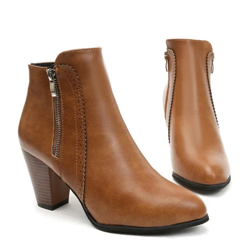 Chic women's comfortable ankle boots for fall/winter, featuring an accessible zipper and unique scalloped design.
